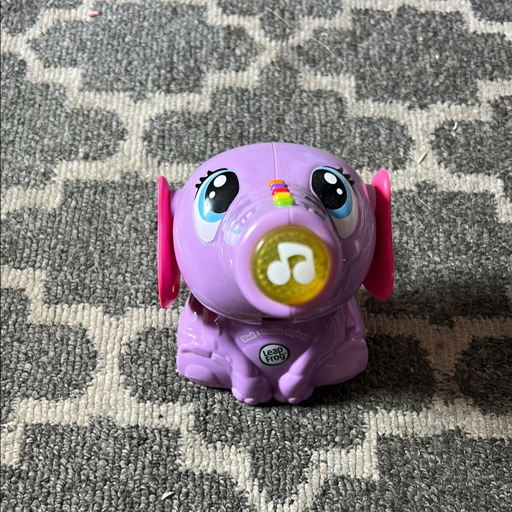 Purple and Pink Learning Toy with Interactive Features